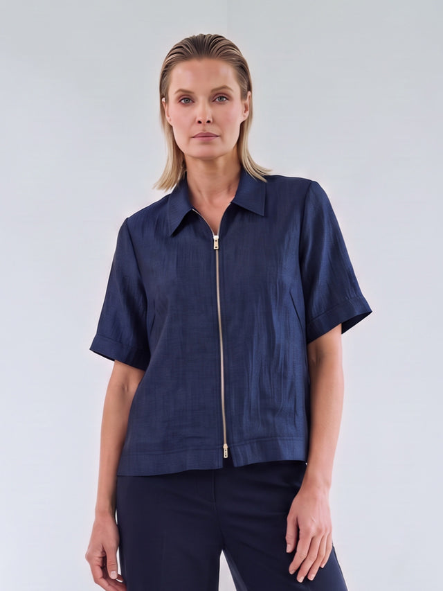 Ize Blouse Navy — close-up op model