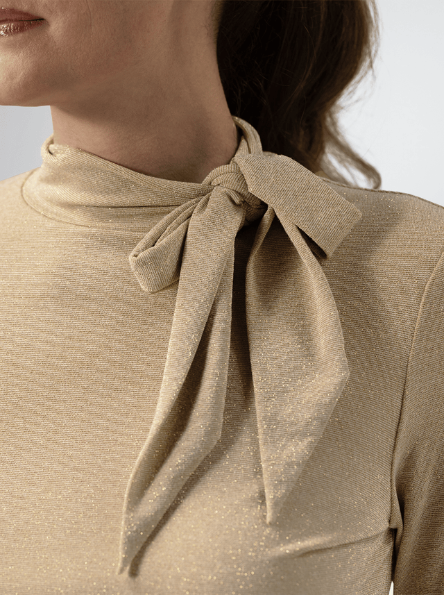BR&DY Skyler Top in goud – detail van de stof