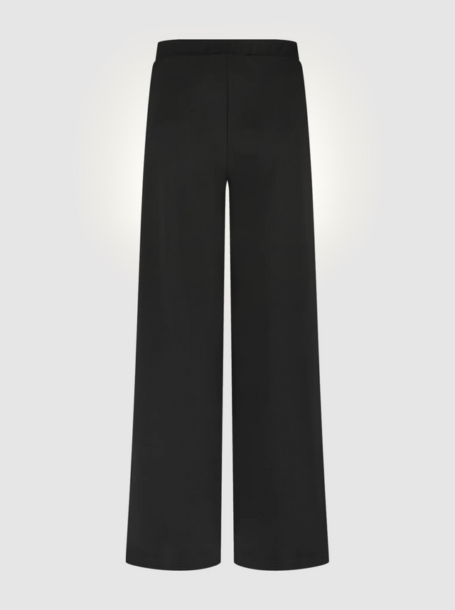 BR&DY Travel Pants in zwart – detail van de stof